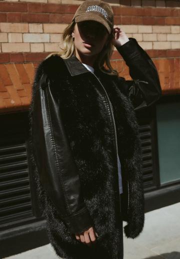 Длинный жилет