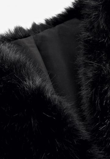 Длинный жилет