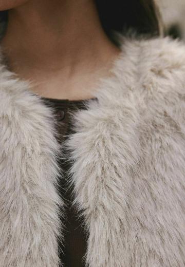 Пуховой жилет