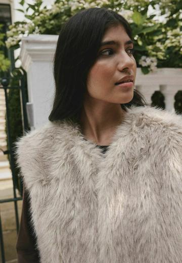 Пуховой жилет