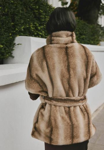 Пуховой жилет