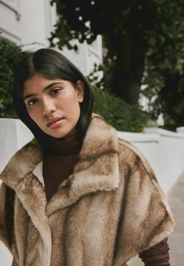 Пуховой жилет