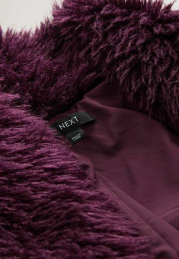 Пуховой жилет