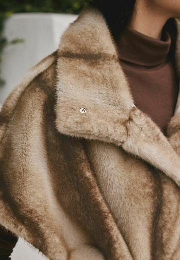 Пуховой жилет