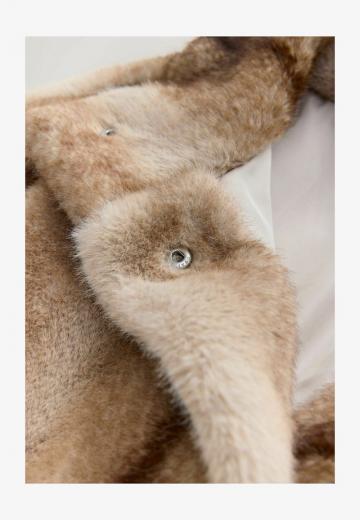 Пуховой жилет