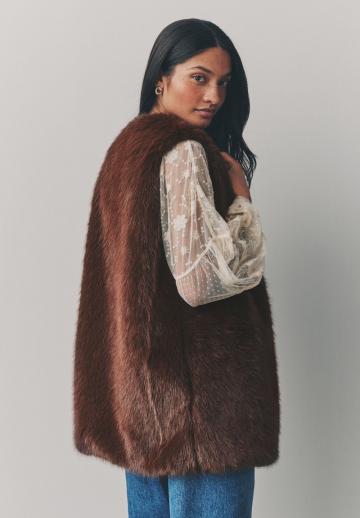 Пуховой жилет