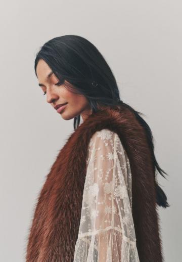 Пуховой жилет