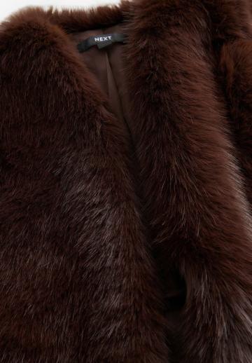 Пуховой жилет