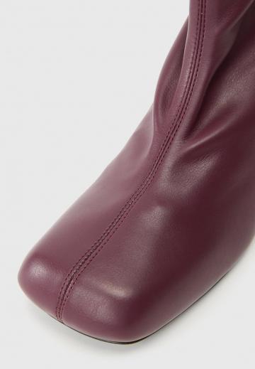 Высокие сапоги