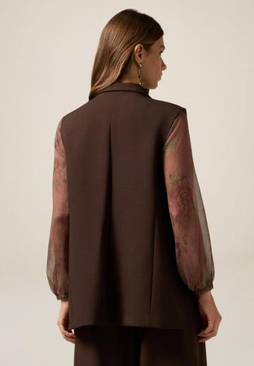 Длинный жилет