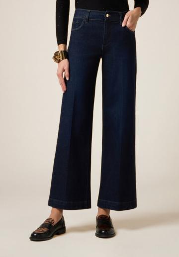 Клешеные джинсы