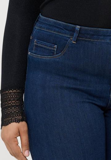 Клешеные джинсы