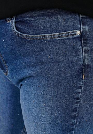 Клешеные джинсы