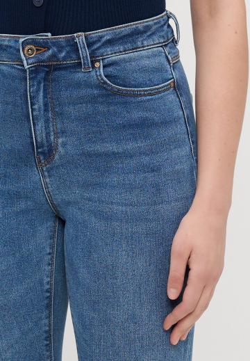 Клешеные джинсы