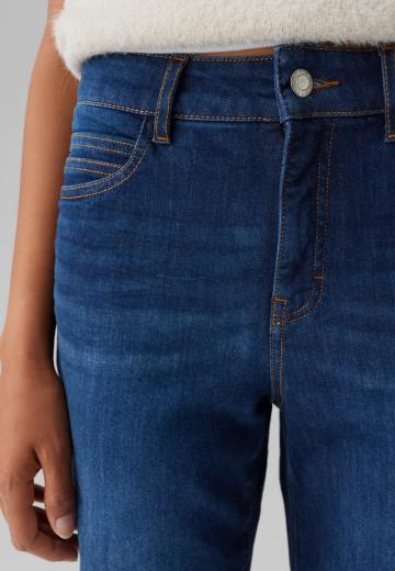 Клешеные джинсы