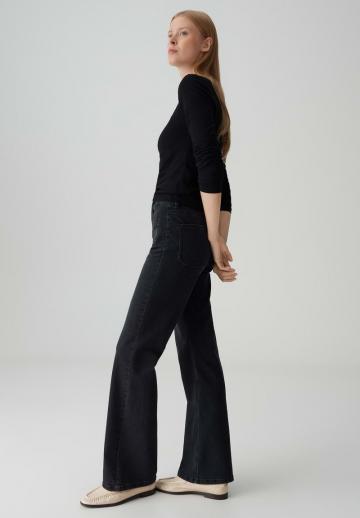 Клешеные джинсы