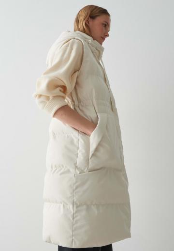 Длинный жилет