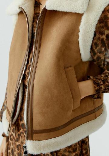 Пуховой жилет