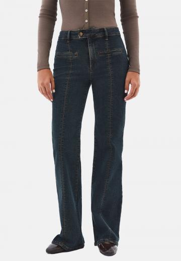 Клешеные джинсы