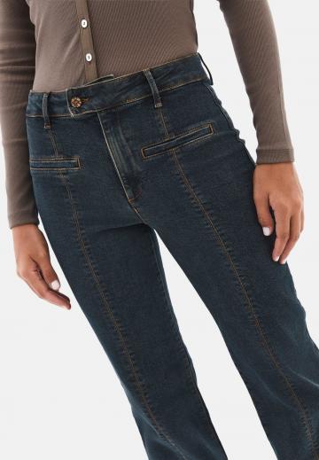 Клешеные джинсы