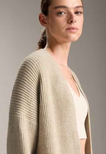 Длинный жилет