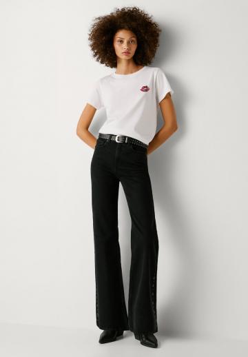 Клешеные джинсы