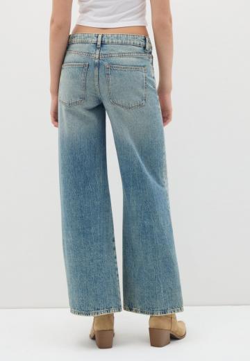 Клешеные джинсы