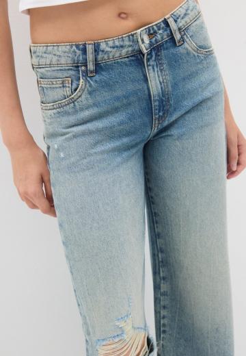 Клешеные джинсы