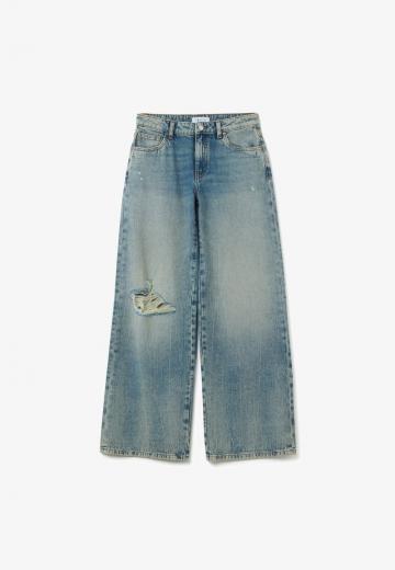 Клешеные джинсы