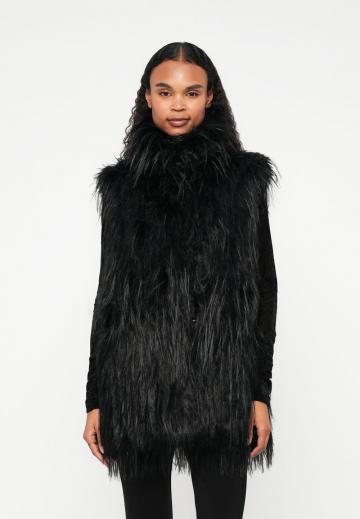 Пуховой жилет