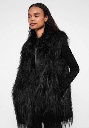 Пуховой жилет