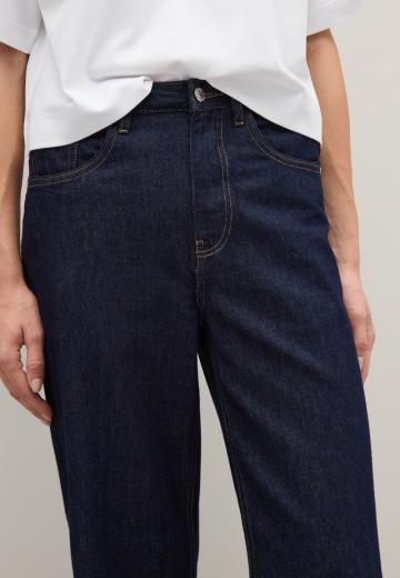 Клешеные джинсы