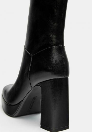 Высокие сапоги