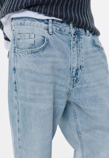 Клешеные джинсы