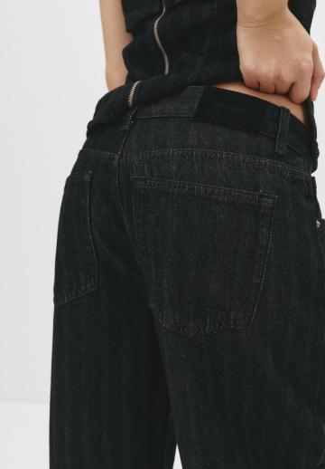 Клешеные джинсы