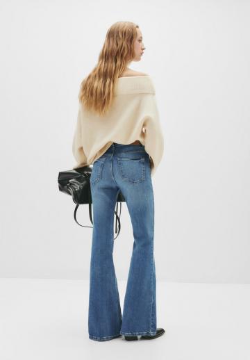 Клешеные джинсы