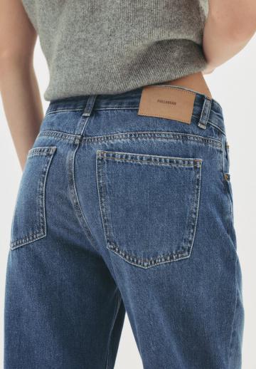 Клешеные джинсы