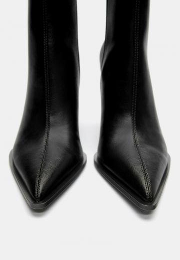 Высокие сапоги