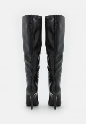 Высокие сапоги