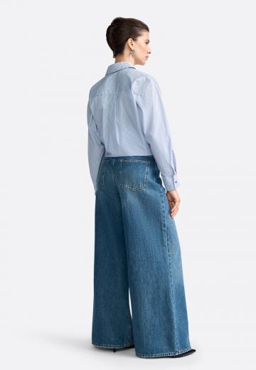 Клешеные джинсы