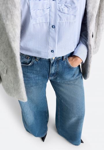 Клешеные джинсы