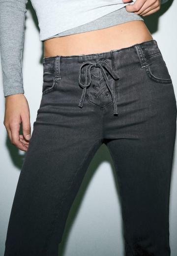 Клешеные джинсы