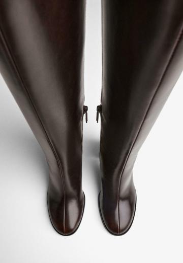 Высокие сапоги