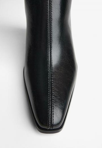 Высокие сапоги