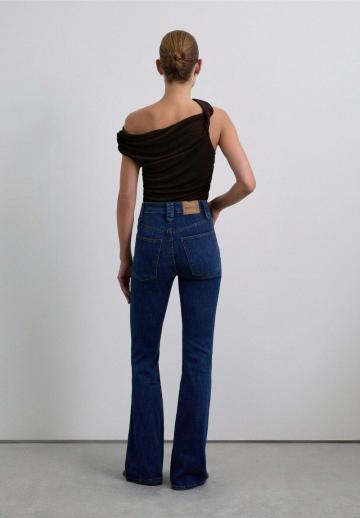 Клешеные джинсы