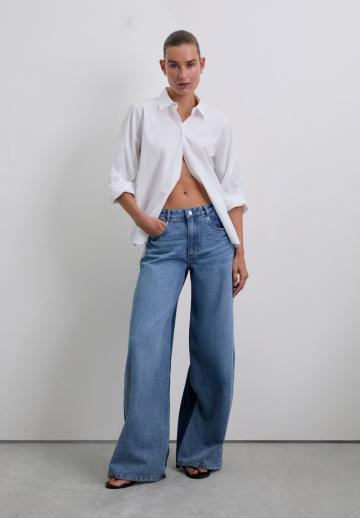 Клешеные джинсы