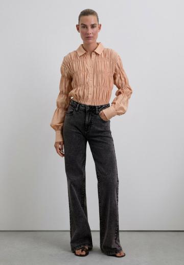 Клешеные джинсы