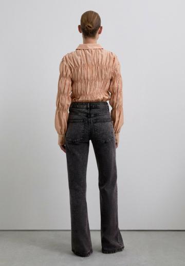 Клешеные джинсы