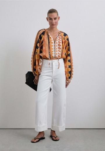 Клешеные джинсы