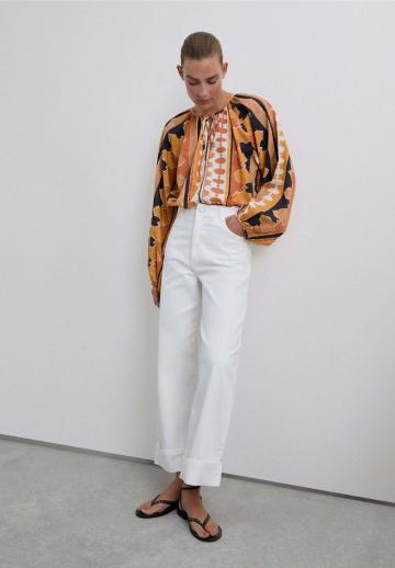 Клешеные джинсы